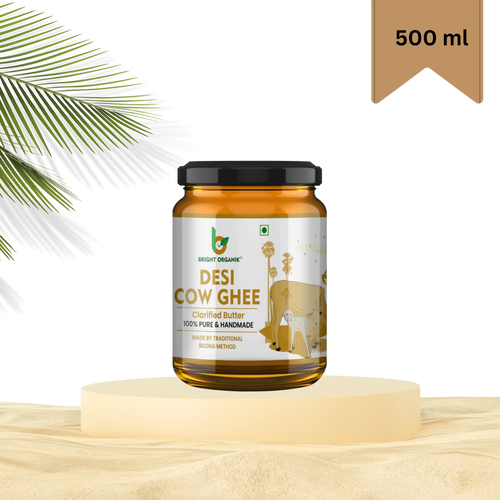 cow ghee in a 500 ml jar kept on wooden mockup table