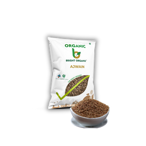 organic ajwain in a bowl with packet of ajwain in background